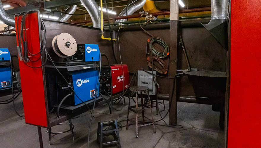 A welding bay showing various pieces of equipment