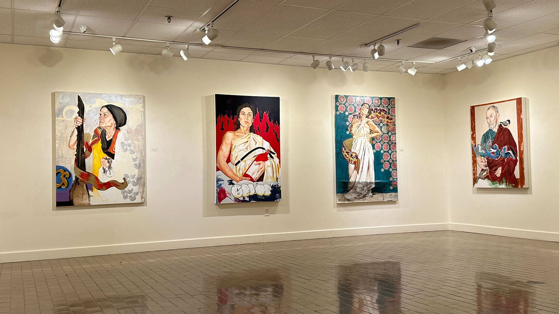 Four paintings in an art gallery with reflections on the polished floor showing different people in various scenes